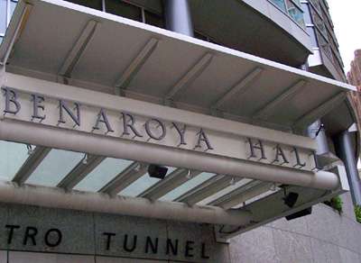 Benaroya Hall entrance with "Metro Tunnel" text below, part of downtown Seattle's new outdoor audio system.
