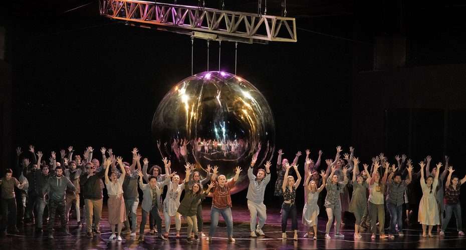 Santa Fe Opera cast of Doctor Atomic with a large disco ball
