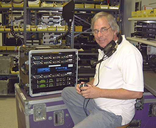 Man in warehouse with PSC RF Multi-Max wireless receiver system