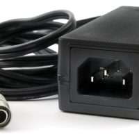 DCR15/1A8U-H power adapter with a coiled cable and a circular connector