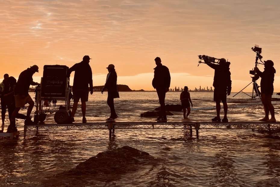 Dane Cody's Australian film crew uses Lectrosonics gear on a beach at sunset.