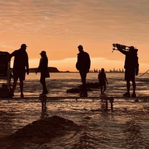 Dane-Cody-and-Lectrosonics1 Sound mixer Dane Cody's crew silhouetted on beach at sunset, Lectrosonics gear.