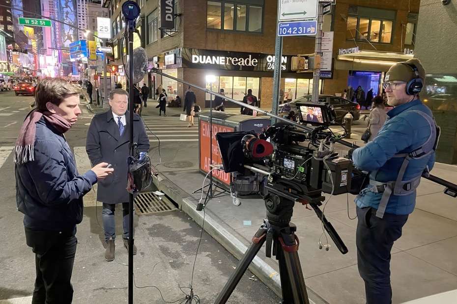 Jesse Kennedy working as a production sound mixer in Times Square, NYC.