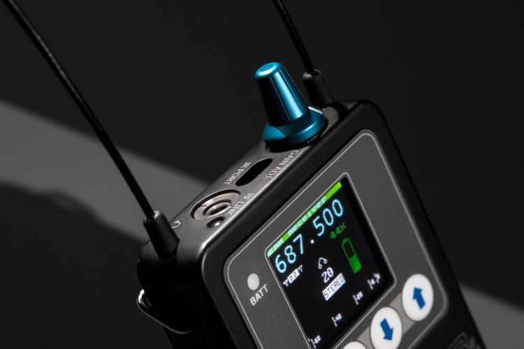 Close-up of Lectrosonics M2Ra receiver with screen displaying frequency 687.500 MHz