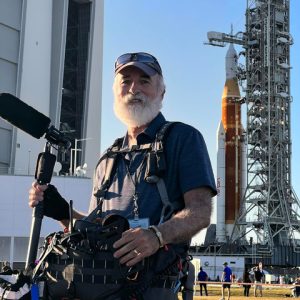 Production mixer Rick Alexander with Lectrosonics gear at a rocket launch site.