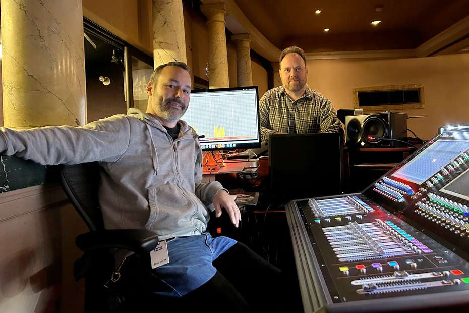 Two men in a sound booth at the Royal Theatre with Lectrosonics digital wireless equipment.