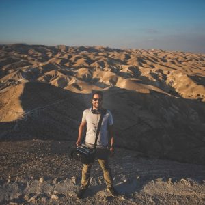 Joseph Dutaillis with Lectrosonics gear in a desert landscape